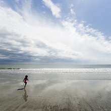 Girl runnning on beach
